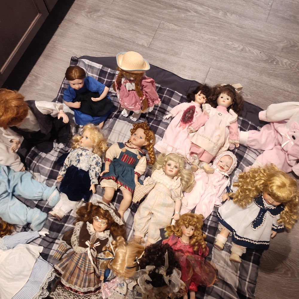 Assorted Doll Collection with Various Outfits